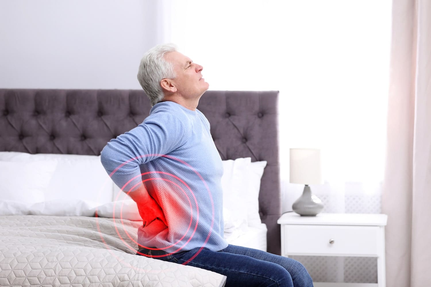 Болит поясница